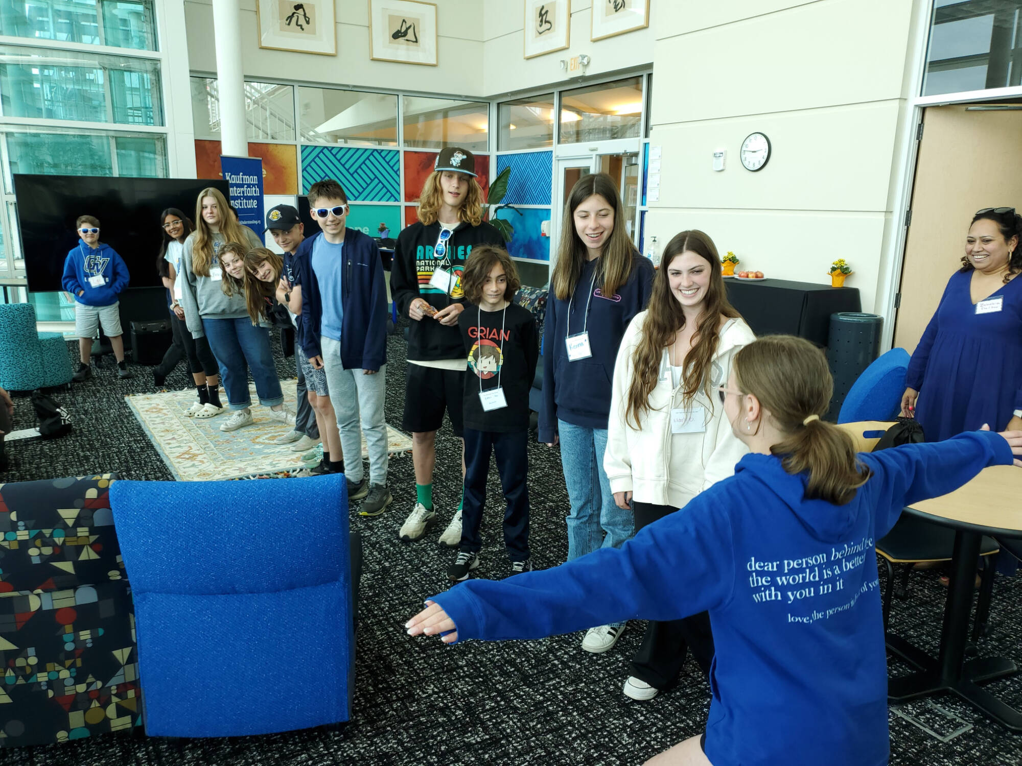 Students interact at the Kaufman office